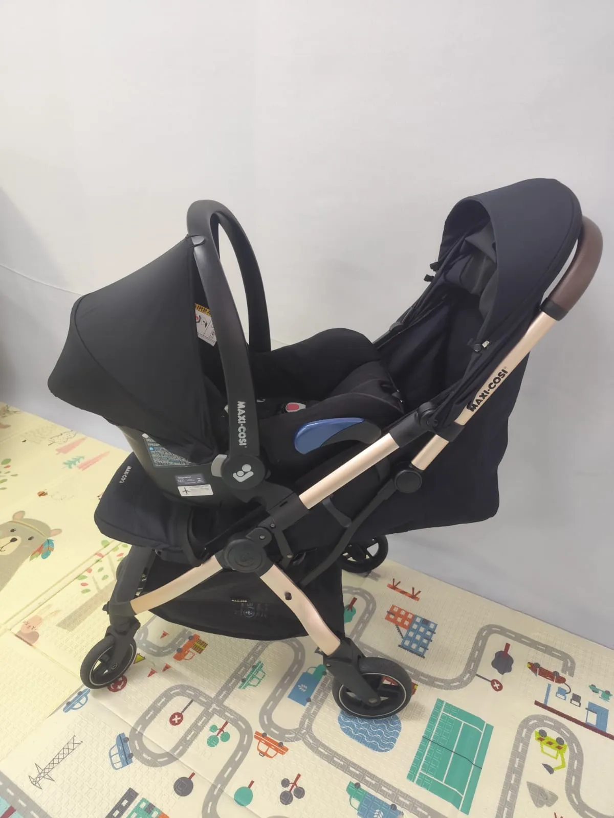 Travel System Carrinho Eva + Bebê Conforto Citi + Adaptador Maxi Cosi